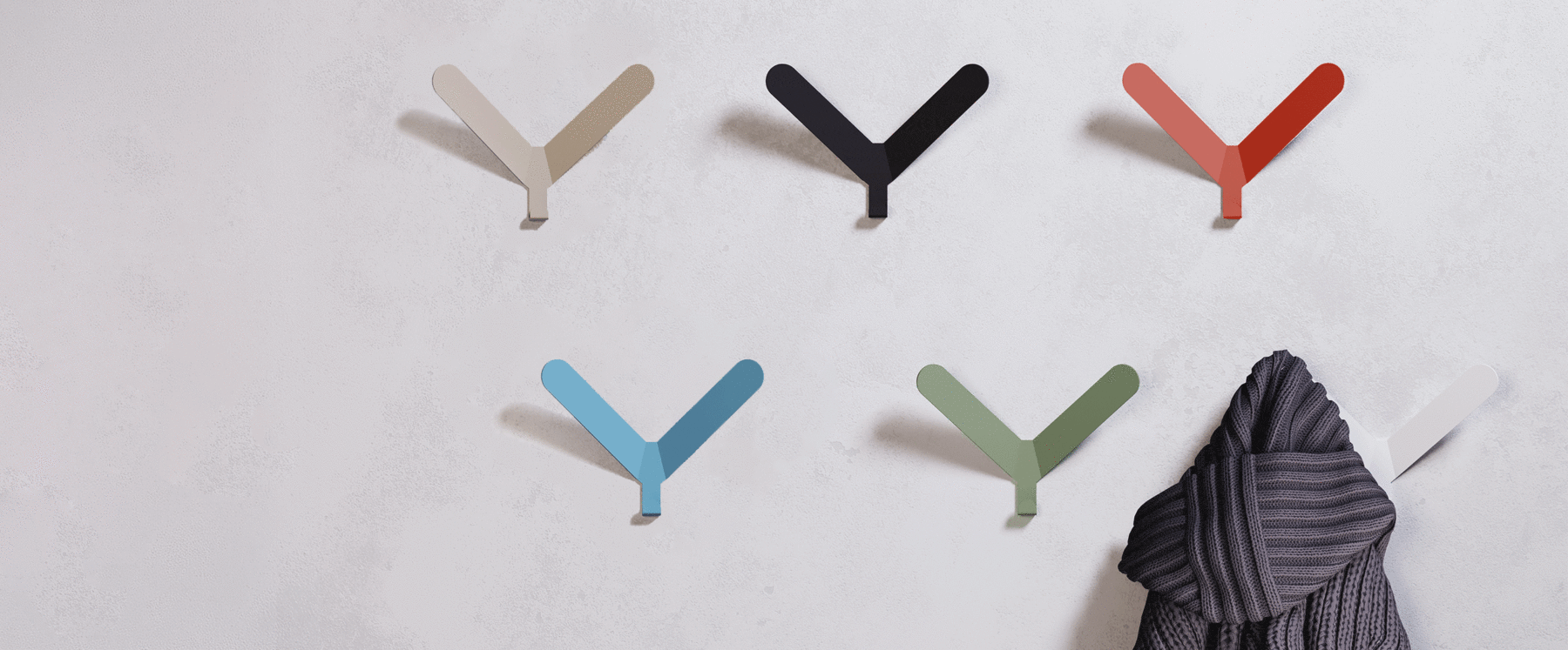 Colorful coat Hooks on wall